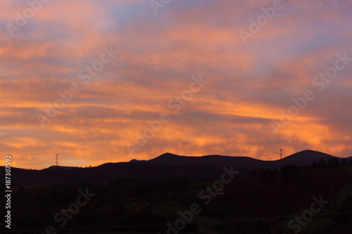 Mountain landscape at sunrise near San Juan in Asturias, Spain © Jeanne Emmel