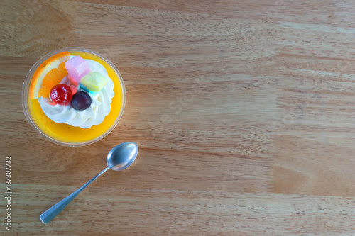 Top view Orange cake on wooden background with copy space