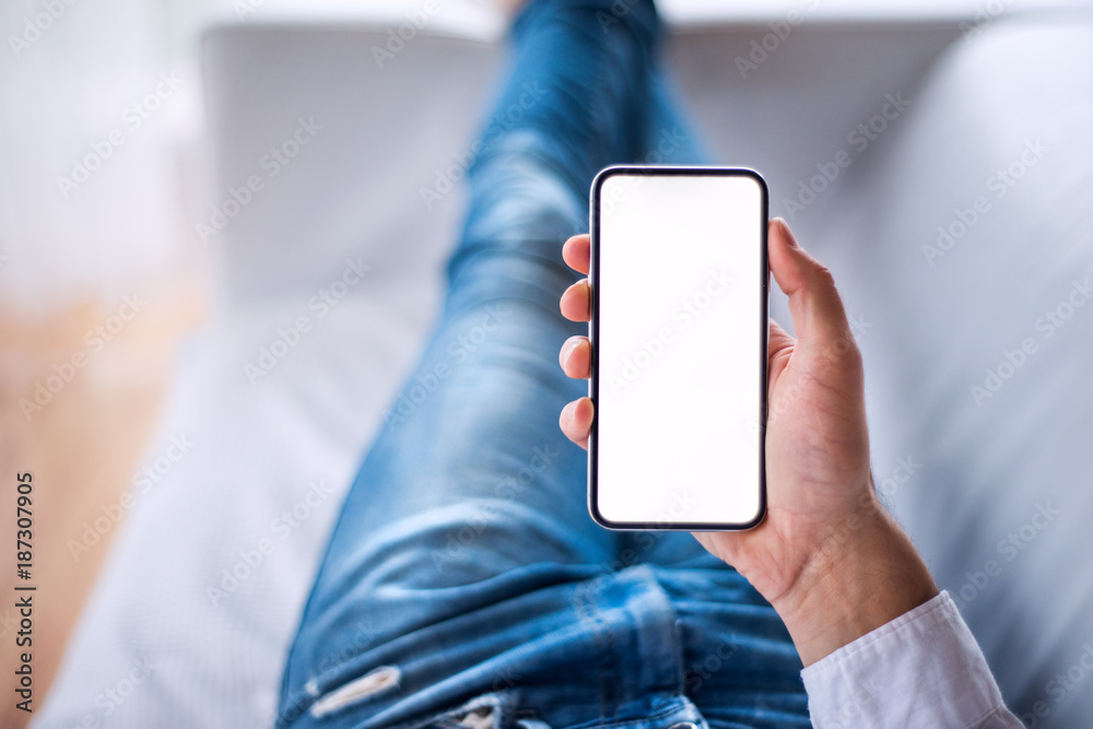 Mockup image of smartphone with blank white screen.