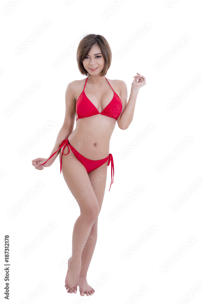 Beautiful young brunette Asian woman wearing red bikini isolated on white background Beautiful young brunette Asian woman wearing red bikini isolated on white background