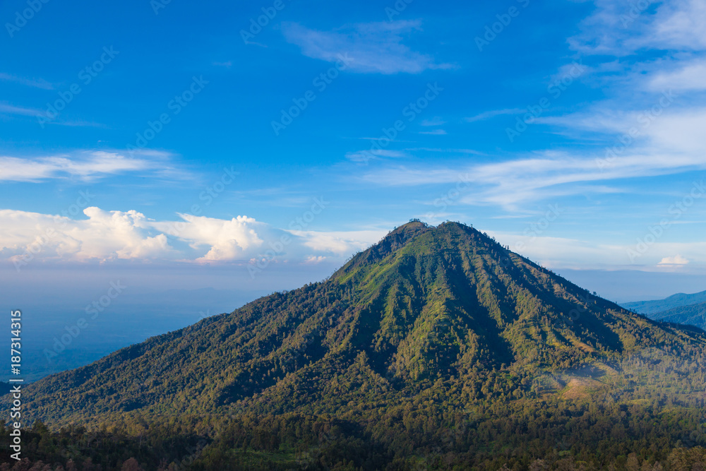 Landscape view of big mountain at Kawah Ijen volcano. Ijen volcano the famous tourist attraction near Banyuwangi, East Java, Indonesia Landscape view of big mountain at Kawah Ijen volcano. Ijen volcano the famous tourist attraction near Banyuwangi, East Java, Indonesia