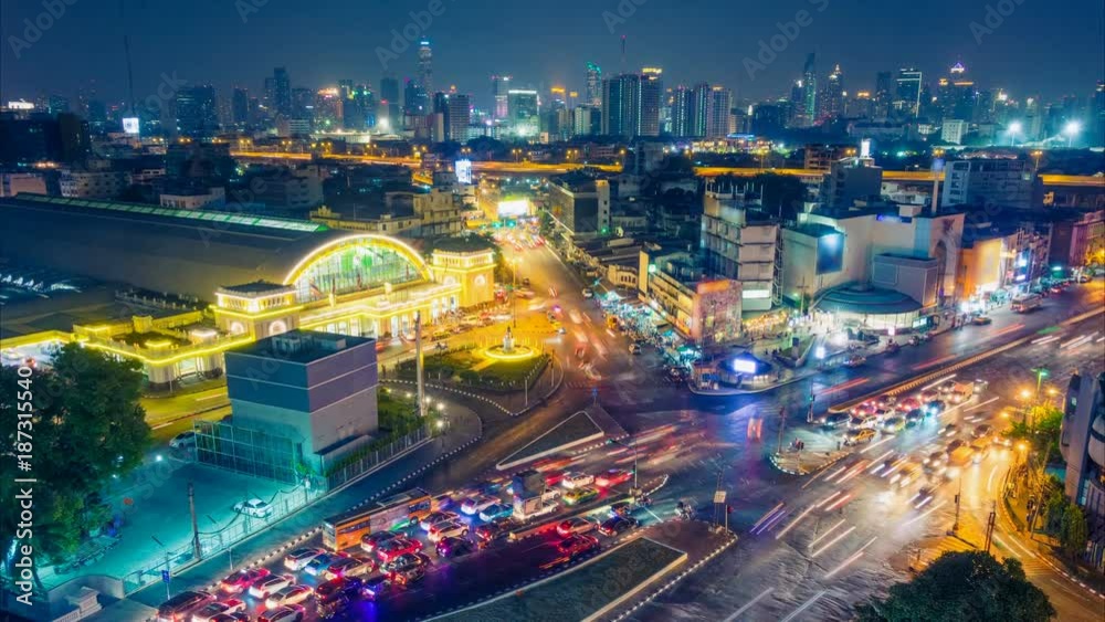 Bangkok night skyline. Aerial cityscape. Time lapse with traffic and blurred traces from cars. Zoom out effect Bangkok night skyline. Aerial cityscape. Time lapse with traffic and blurred traces from cars. Zoom out effect