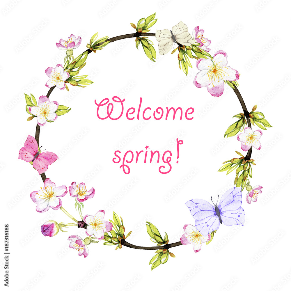 spring wreath from twigs, young foliage, butterflies and spring flowers
