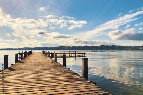 Empty wooden pier on Lake Starnberg in Bavaria  Germany