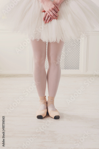 Ballerina legs closeup in sixth position