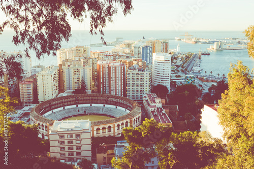 Aerial view at Malaga with Bullring of La Malagueta. Cityscape of Malaga with port and Bull arena, 18th Century Plaza de Toros de Ronda bullring in Malaga Spain