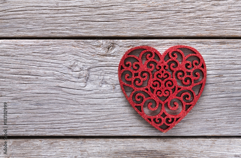 Valentine background with lace red heart shape on rustic wood Valentine background with lace red heart shape on rustic wood