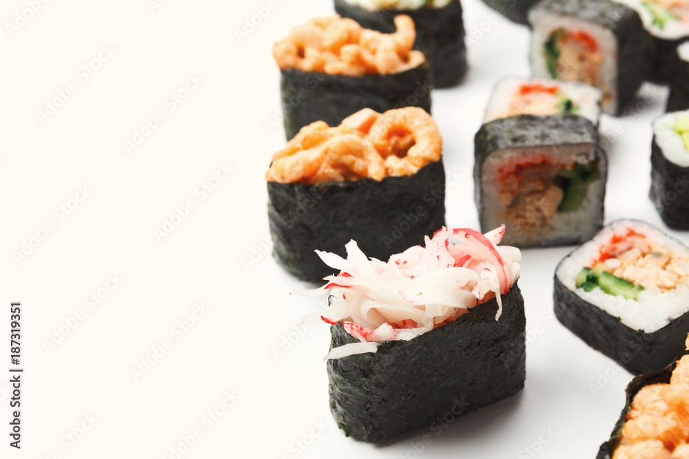 Gunkan, sushi, maki and rolls isolated closeup Gunkan, sushi, maki and rolls isolated closeup
