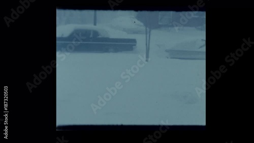 1964 blizzard blankets vintage cars and neighborhood in snow