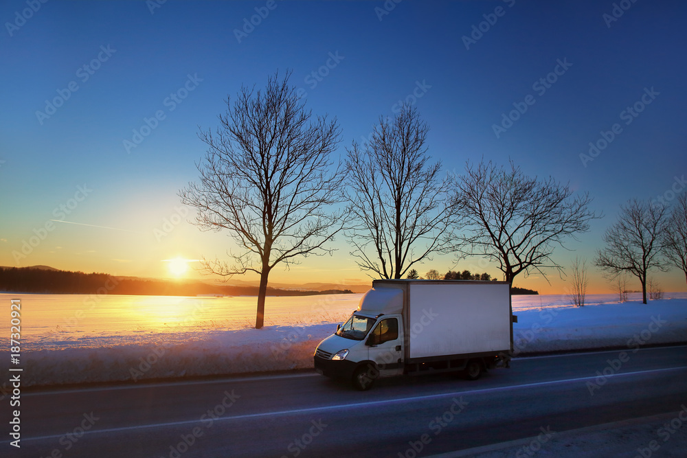 Truck transportation at sunset