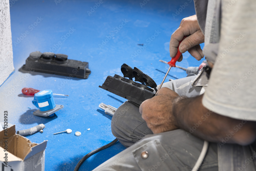 Electrician Installing Plug Electrician Installing Plug