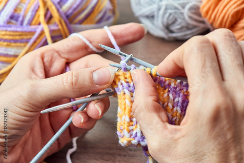 Young Woman Knitting - Knitting inspiration is at your fingertips