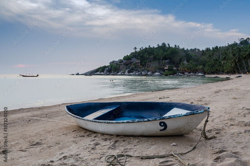 Beautiful beach with motor boat at toa island, Thailand