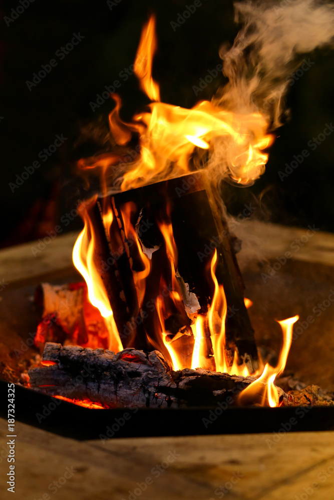 fire flames with sparks on a black background fire flames with sparks on a black background