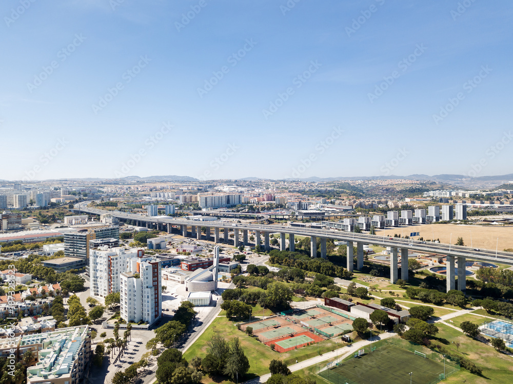 Aerial View Of Vasco da Gama Bridge And High Car Traffic In Lisbon City Of Portugal