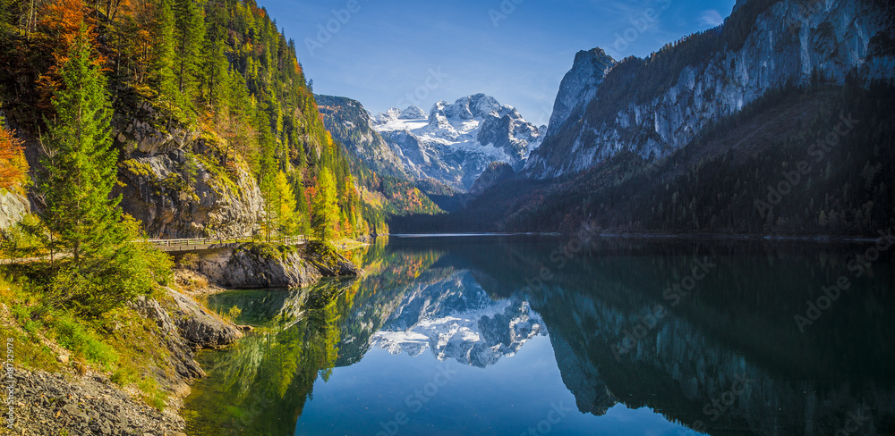 Mountain scenery in the Alps with Dachstein summit reflecting in Lake Gosausee, Salzkammergut, Austria