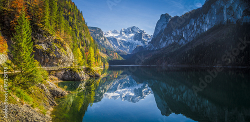 Mountain scenery in the Alps with Dachstein summit reflecting in Lake Gosausee, Salzkammergut, Austria