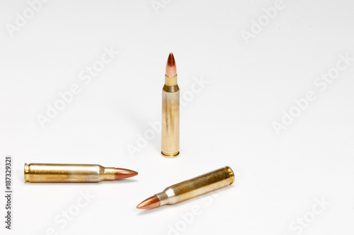 Three isolated 223 cartriges on a white background photo