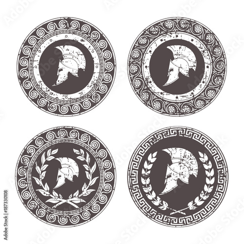 Spartan helmet an icon on old paper in style grunge, is issued in antique Greek style.