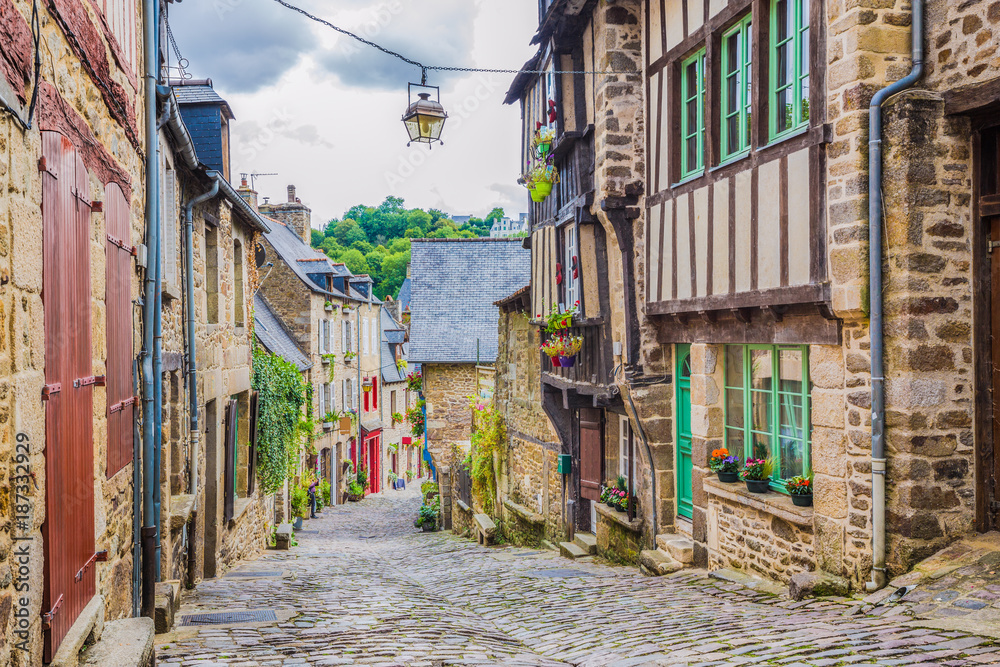 Charming alley scene in an old town in Europe Stock Photo | Adobe Stock