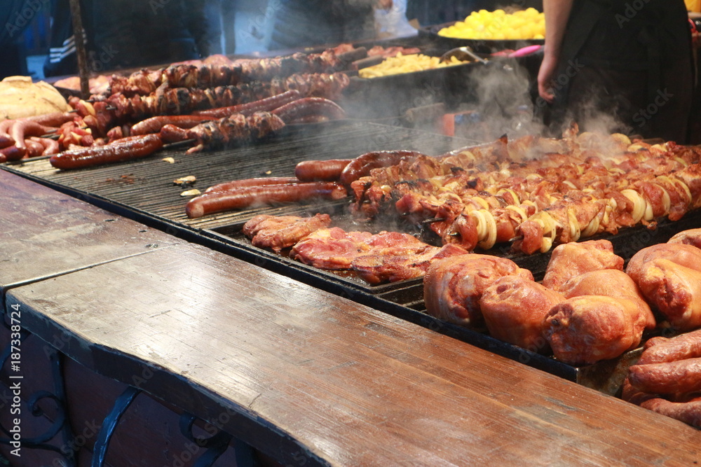street food: grilled sausages, shish kebab and pork knuckle