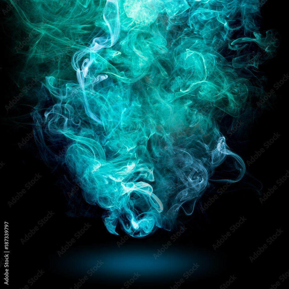 bluish-green swirl of smoke on black background
