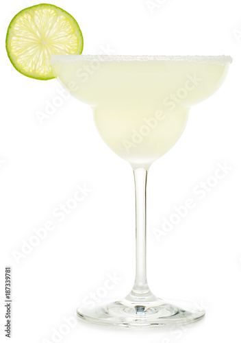 glass of margarita with salt rim and lime isolated on white