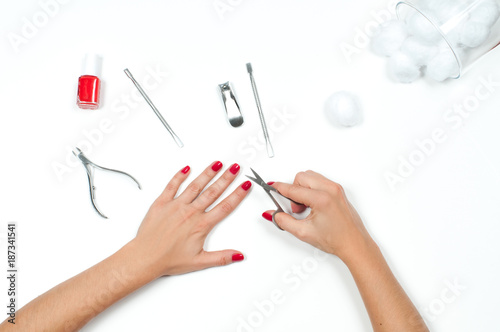 Beautiful female hands with red manicure
