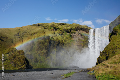 Fototapeta Naklejka Na Ścianę i Meble -  Rainbow over Massive Waterfall 