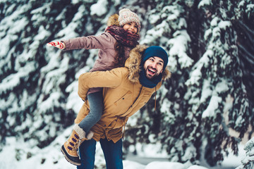 Dad with daughter outdoor in winter