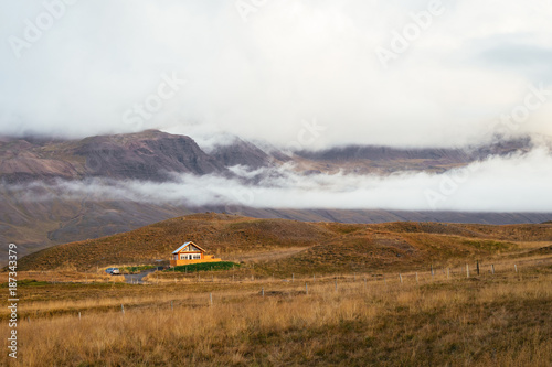 Single Cabin Alone Among Hills and Fog