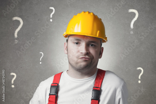 фотографія Confused young worker