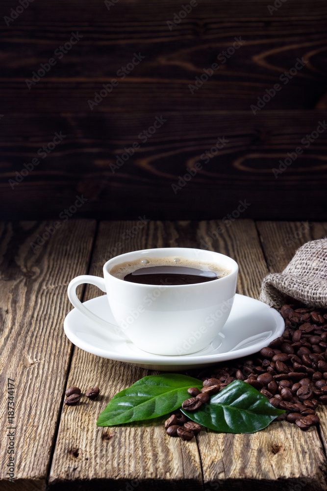 Cup of coffee on wooden rustic table Cup of coffee on wooden rustic table