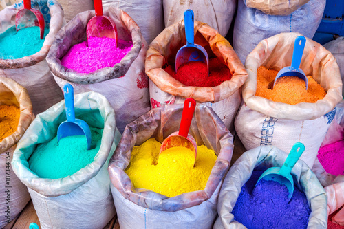 Colorful pigments in bags © dinozzaver