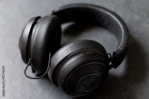 Black headphones on dark background