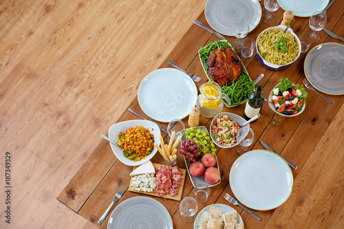 various food on served wooden table