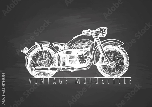 Vintage motorcycle on blackboard