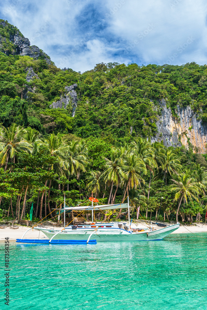 Small bangka boat on the bay of El Nido, Philippines