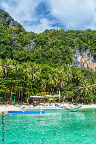 Small bangka boat on the bay of El Nido, Philippines