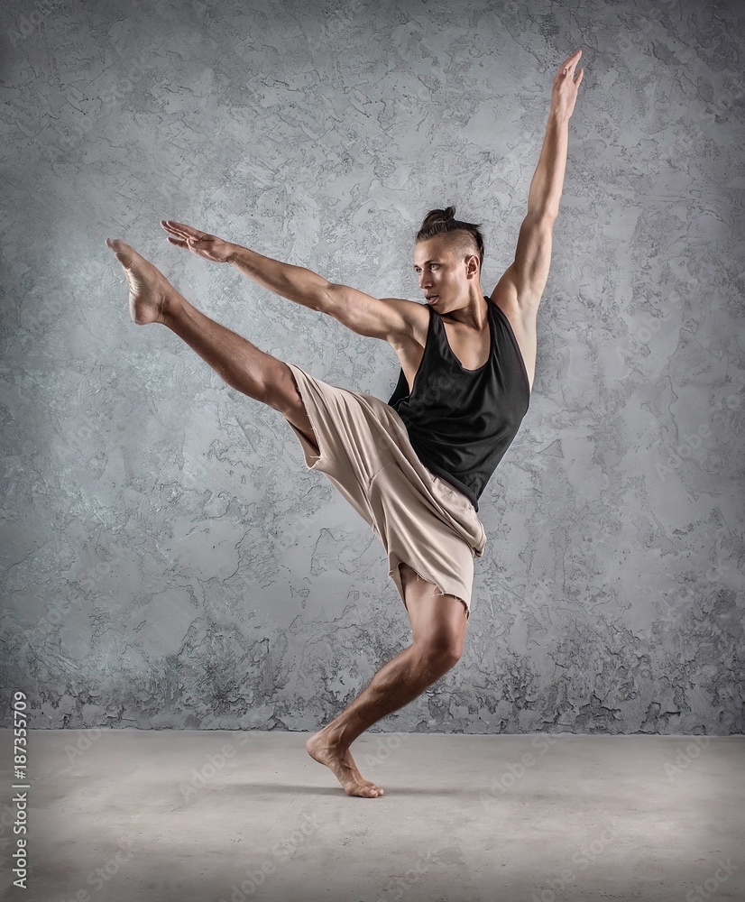 Obraz premium Man dancer, in beautiful dynamic jump action figure on the grung