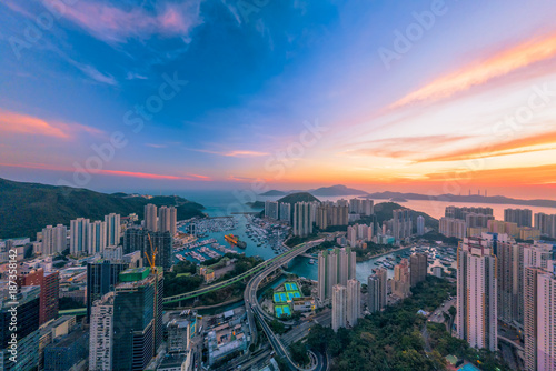 Panoramic Aerial View of a Stunning Sunset over Aberdeen And Ap Lei Chau district of Hong Kong © kingrobert