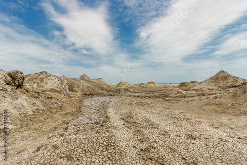 Ancient warm mud volcanoes that swirl with dirt from the bowels of the earth.
