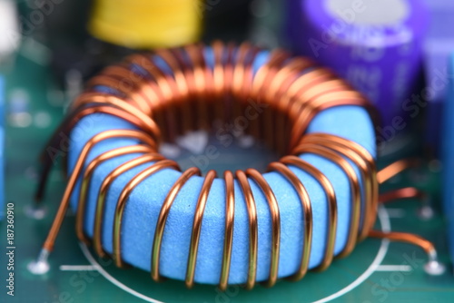 Inductor copper coil on circuit board photo