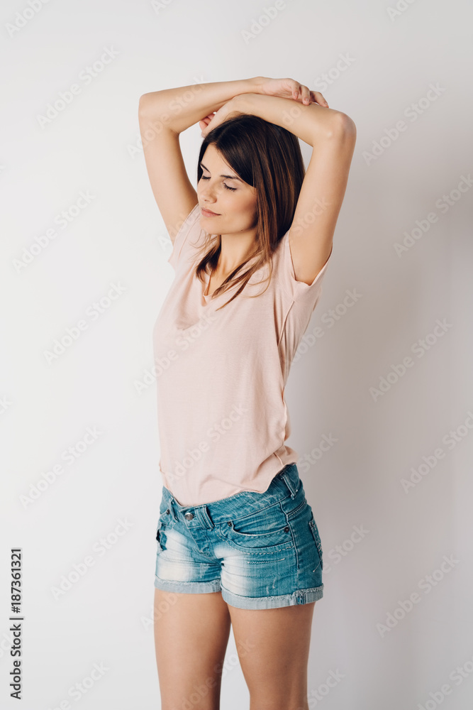 Serene young woman taking a moment to relax Serene young woman taking a moment to relax