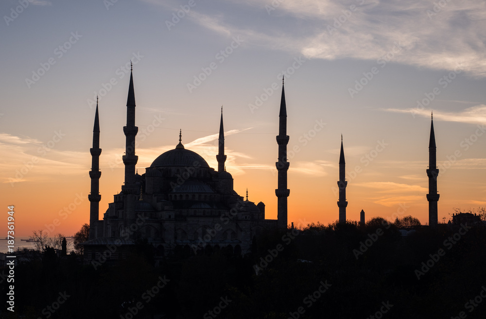 Silhouette of Blue mosque Sultan Ahmed on sunset background in Istanbul, Turkey