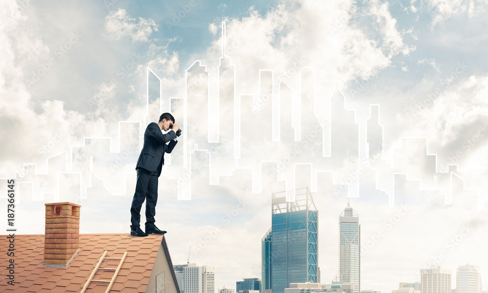 Businessman standing on roof and looking in binoculars. Mixed me Businessman standing on roof and looking in binoculars. Mixed me