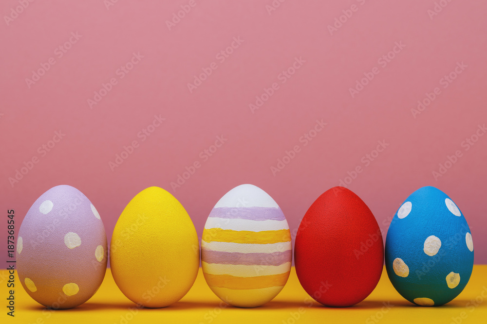 Multicolored easter eggs with space for text, close-up