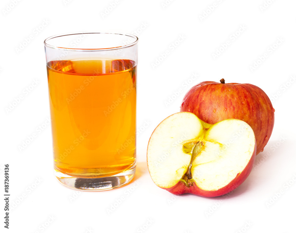 Apple juice in a glass beaker and two fresh sliced apple isolated on a white background Apple juice in a glass beaker and two fresh sliced apple isolated on a white background