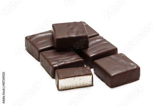 Chocolate candies isolated on white background, bird's milk