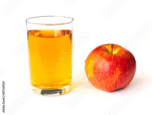 Apple juice in glass cup and fresh, covered with water drops, apple isolated on white background